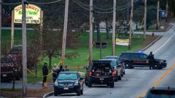 Police presence at Schemengees Bar where a mass shooting occurred yesterday in Lewiston, Maine on October 26, 2023. A massive manhunt was under way on October 26 for a gunman who a local official said killed at least 22 people and wounded dozens more in mass shootings in the US state of Maine, the deadliest such incident this year.