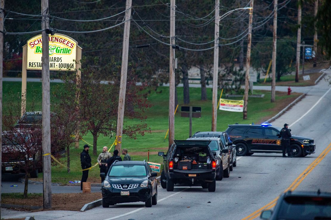 Police presence at Schemengees Bar where a mass shooting occurred yesterday in Lewiston, Maine on October 26, 2023. A massive manhunt was under way on October 26 for a gunman who a local official said killed at least 22 people and wounded dozens more in mass shootings in the US state of Maine, the deadliest such incident this year.