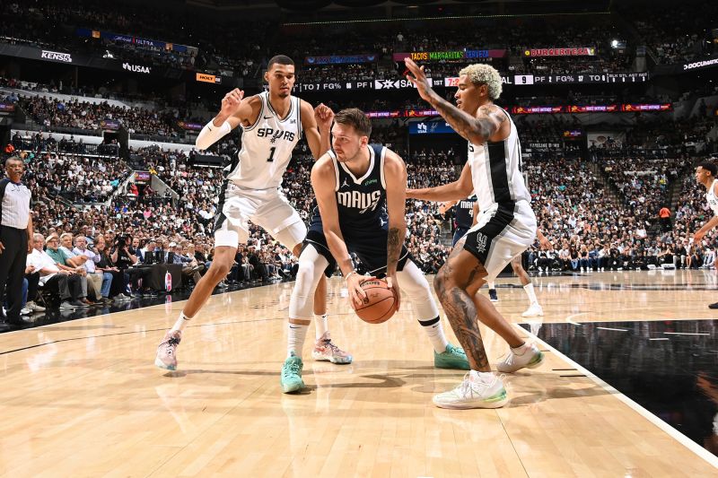 San Antonio Spurs suffer defeat against Dallas Mavericks as Victor Wembanyama grapples with foul issues in NBA debut