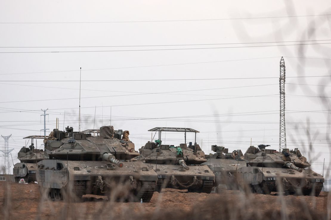 Israeli tanks are positioned near Israel's border with the Gaza Strip, in southern Israel, October 22, 2023. REUTERS/Violeta Santos Moura