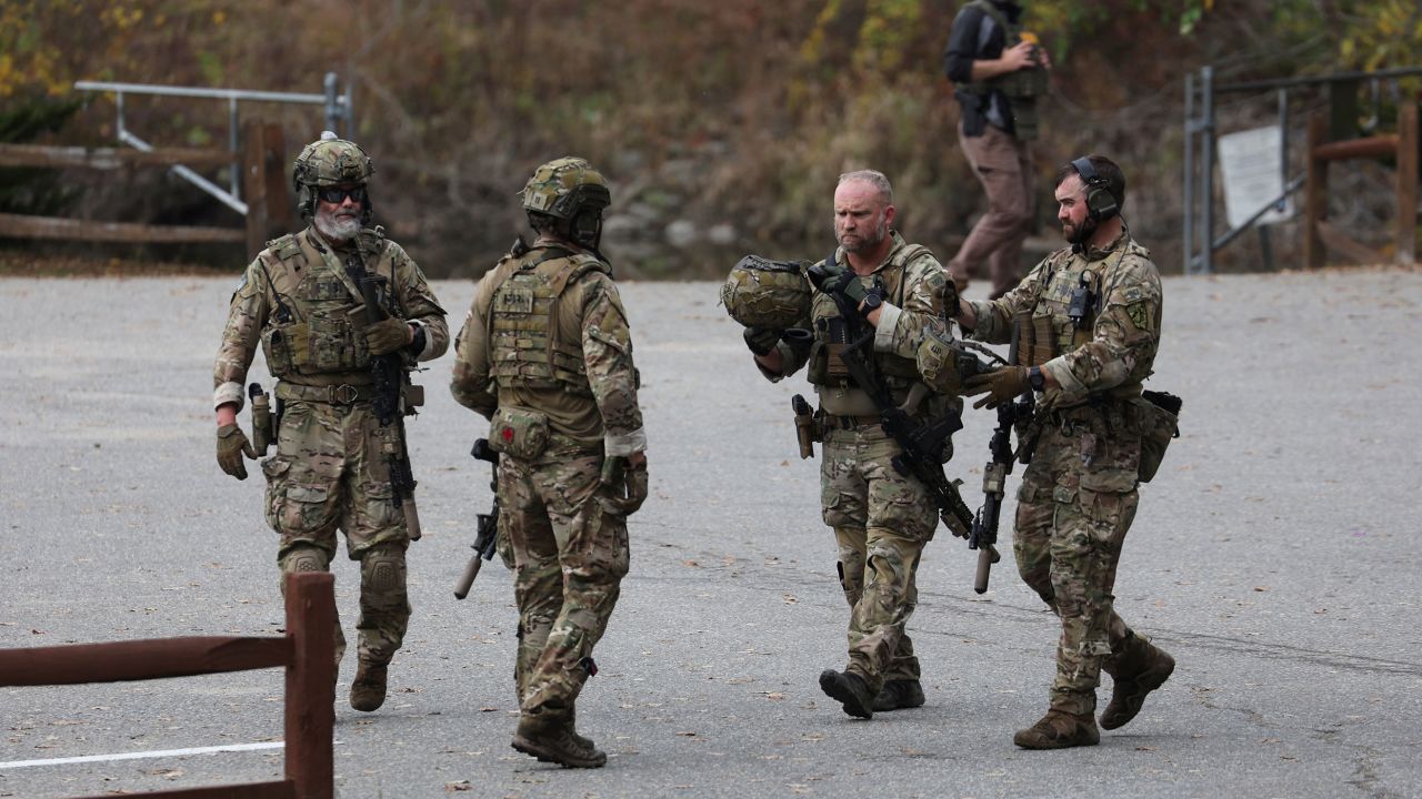 Law enforcement members patrol near a Lisbon school, following a deadly mass shooting in Lewiston, in Lisbon Falls, Maine, U.S. October 26, 2023.  REUTERS/Shannon Stapleton