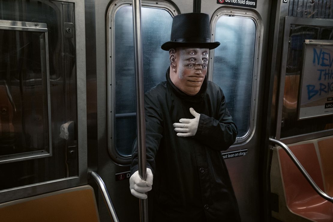Vertiginous face paint illusion on the subway.