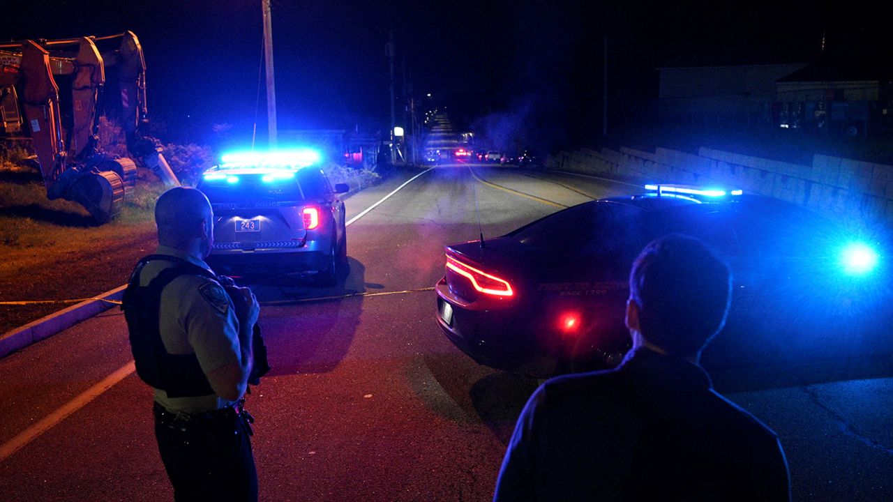 Police close Lincoln Street leading to Schemengees Bar & Grille Restaurant after deadly mass shootings in Lewiston, Maine, U.S. October 26, 2023.