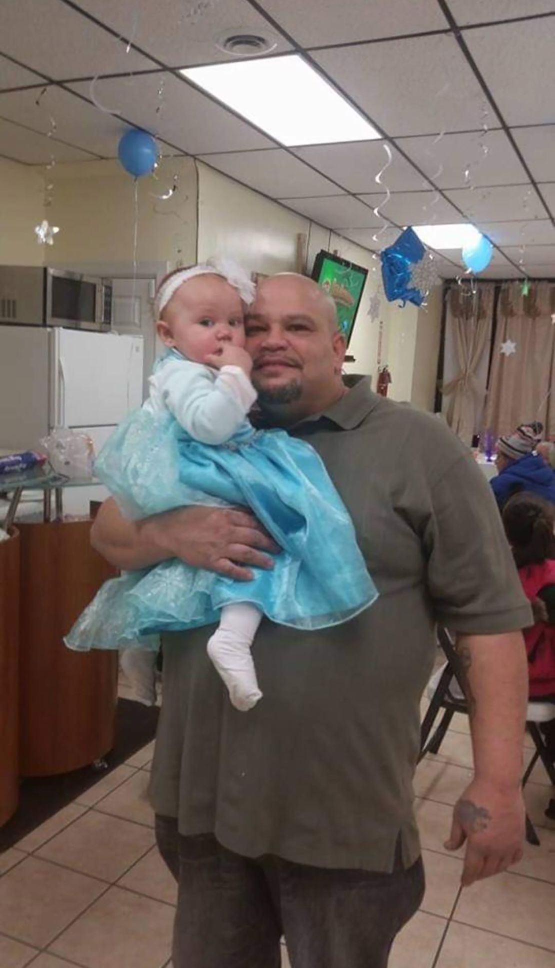 Serabi, left, and her father, Michael Medina. 