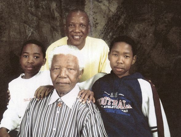 Mandela with his son Makgatho and grandchildren Andile (left) and Mbuso (right). After other careers, Makgatho studied law in his forties at his father's behest, then practiced it before his death in 2005 of an AIDS-related illness. "For (Makgatho), going to work after high school was a necessity and not necessarily a choice," said his younger sister. "So, when my father came out of prison and insisted that he get a higher education it was a no brainer and the next logical step."
