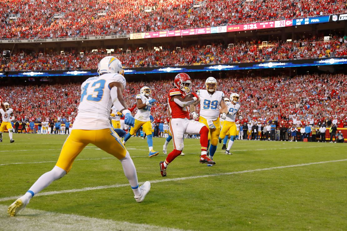 KANSAS CITY, MISSOURI - OCTOBER 22: Isiah Pacheco #10 of the Kansas City Chiefs scores a touchdown against the Los Angeles Chargers during the fourth quarter of the game at GEHA Field at Arrowhead Stadium on October 22, 2023 in Kansas City, Missouri. (Photo by David Eulitt/Getty Images)