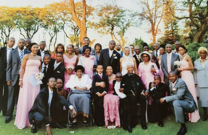 Nelson Mandela at the wedding of granddaughter Nandi, the youngest child of his first son Thembekile. Family gatherings are "often chaotic, but fun," said Dr. Mandela. "Everything has to be planned far in advance and we always forget someone, because my family is large and sometimes have to have extra seating as you never know who could show up. Once Michael Jackson just showed up at one of my father's birthdays. The grandchildren were beside themselves and my daughter who was obsessed with him as a teenager tried very hard not to have a complete meltdown. She held herself together well though."
