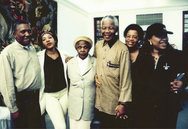 Nelson Mandela with family and soon-to-be third wife Graça Machel (second right) on the day she was formally introduced to everyone. "I already knew long before that my father was in a relationship with Mrs. Machel, and I had met her a few years back at a UNESCO conference in Paris," said Dr. Mandela. <br /><br />"We were having a private chat and I had recommended that she and my father could not continue dating and that they should formalize their relationship and get married to set an example for the rest of the family. So when my father introduced Mrs. Machel to the family it was not really a surprise to me."