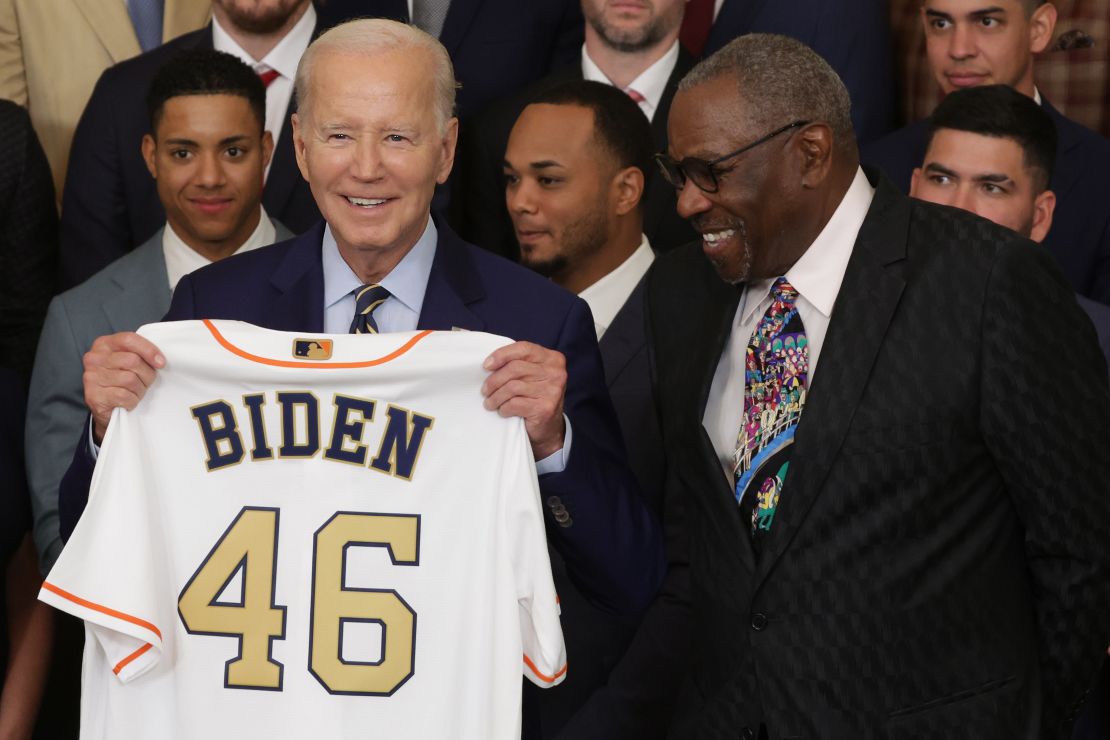 WASHINGTON, DC - AUGUST 07: U.S. President Joe Biden holds up a jersey as team manager of the Houston Astros Dusty Baker looks on during an East Room event at the White House on August 7, 2023 in Washington, DC. President Biden hosted the Houston Astros at the White House to honor their 2022 World Series victory. (Photo by Alex Wong/Getty Images)