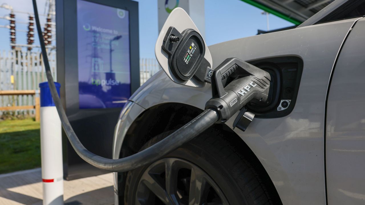 An electric vehicle charges on an ultra-fast 300KW BP Plc Pulse charger at NEC Group Gigahub public electric vehicle charging hub in Birmingham, UK, on Thursday, Sept. 7, 2023. The UK is seeking to install at least 300,000 public EV chargers by the end of the decade, as part of its plan for net zero greenhouse gas emissions by mid-century. Photographer: Hollie Adams/Bloomberg via Getty Images