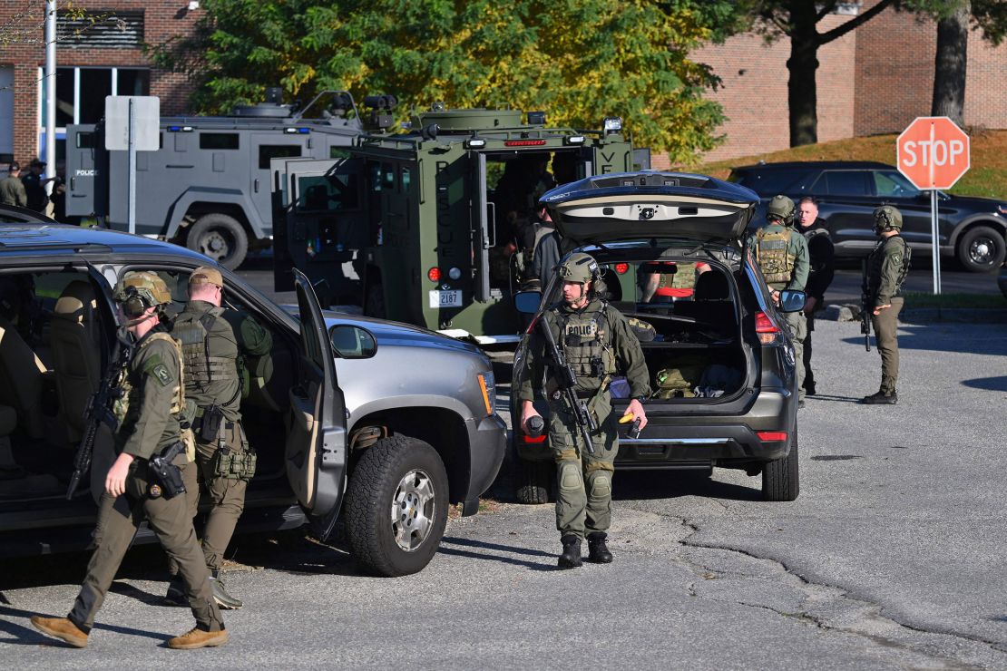 Law enforcement prepare for a search for a gunman who killed 18 people two days ago, in Lewiston, Maine, on October 27, 2023. Police in Maine struggled for a second day to catch a man who gunned down 18 people with a semi-automatic rifle in a bowling alley and a bar in a town where locals were enjoying an evening out. Robert Card, 40, is accused of being the man seen on security cameras walking into a Lewiston bowling alley on the evening of October 25, 2023, and launching the country's deadliest mass shooting of the year so far. In addition to the 18 murdered at the bowling venue and later in a bar, the US Army reservist is accused of wounding 13. (Photo by ANGELA WEISS / AFP) (Photo by ANGELA WEISS/AFP via Getty Images)