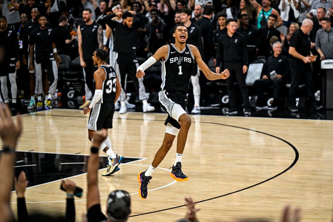 San Antonio Spurs' French forward-center #01 Victor Wembanyama celebrates after winning the NBA basketball game between the Houston Rockets and the San Antonio Spurs at the AT&T Center in San Antonio, Texas, on October 27, 2023. (Photo by CHANDAN KHANNA / AFP) (Photo by CHANDAN KHANNA/AFP via Getty Images)