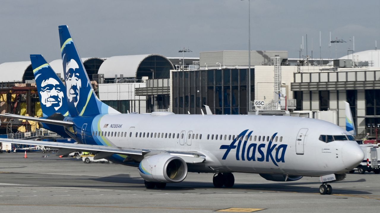 An Alaska airlines plane seen at Los Angeles International Airport (LAX) on January 11, 2023. (Photo by Daniel SLIM / AFP) (Photo by DANIEL SLIM/AFP via Getty Images)