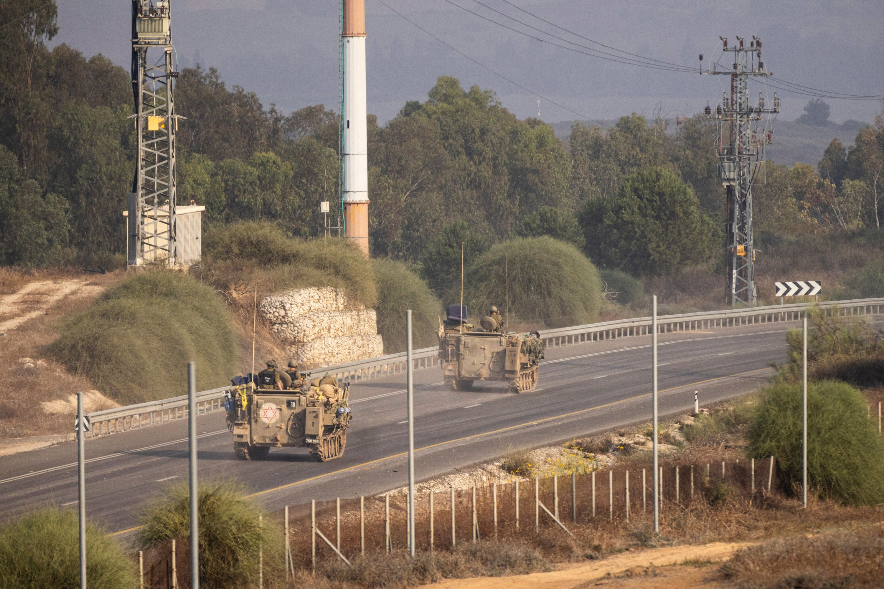 Israeli armored vehicles on the move near the border with Gaza, in Sderot, Israel on the morning of October 28.