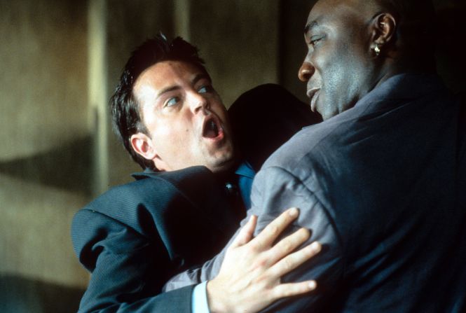 Michael Clarke Duncan tackles Perry in a scene from the 2000 film "The Whole Nine Yards."