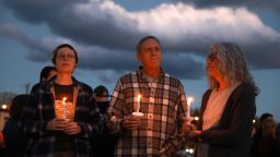 LISBON, MAINE - OCTOBER 28: People attend a candlelight vigil to honor the victims of the Lewiston shootings on October 28, 2023 in Lisbon, Maine. Card killed 18 people in a mass shooting at a bowling alley and a restaurant in Lewiston and was found dead in Lisbon.   (Photo by Joe Raedle/Getty Images)