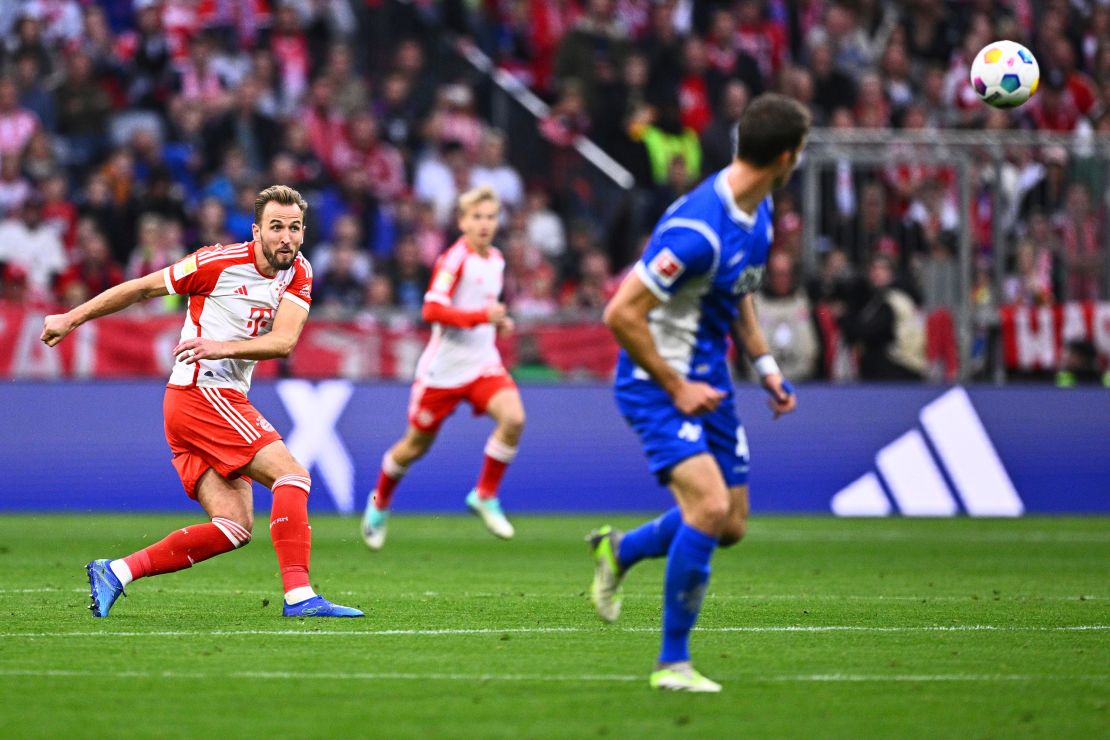 Bayern's Harry Kane scores his side's fifth goal during the German Bundesliga soccer match between Bayern Munich and SV Darmstadt 98 at the Allianz Arena in Munich, Germany, Saturday, Oct. 28, 2023. (Tom Weller/dpa via AP)