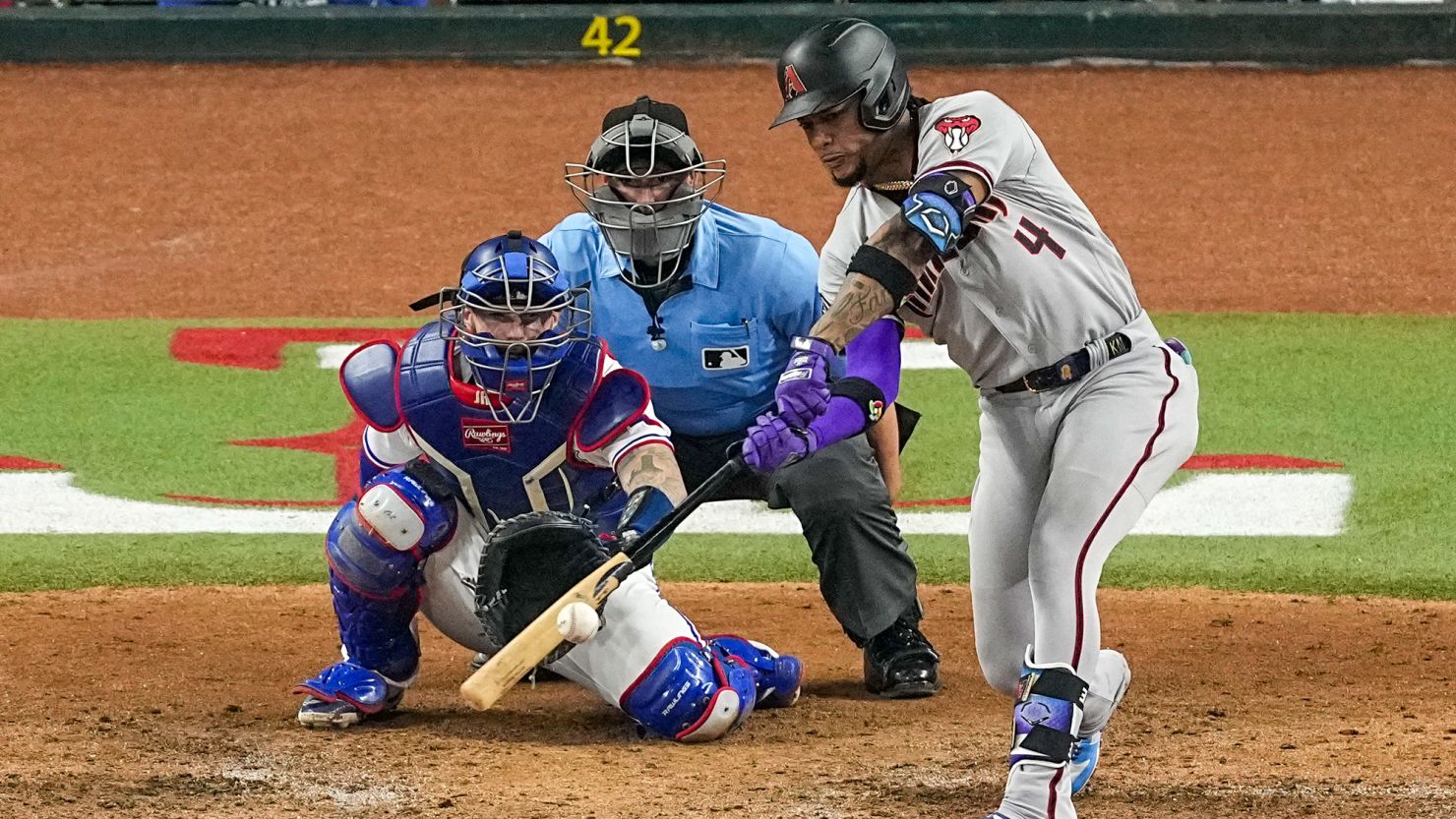 Arizona Diamondbacks' Ketel Marte hits a two-run single against the Texas Rangers during the eighth inning in Game 2 of the baseball World Series Saturday, Oct. 28, 2023, in Arlington, Texas. (AP Photo/Tony Gutierrez)