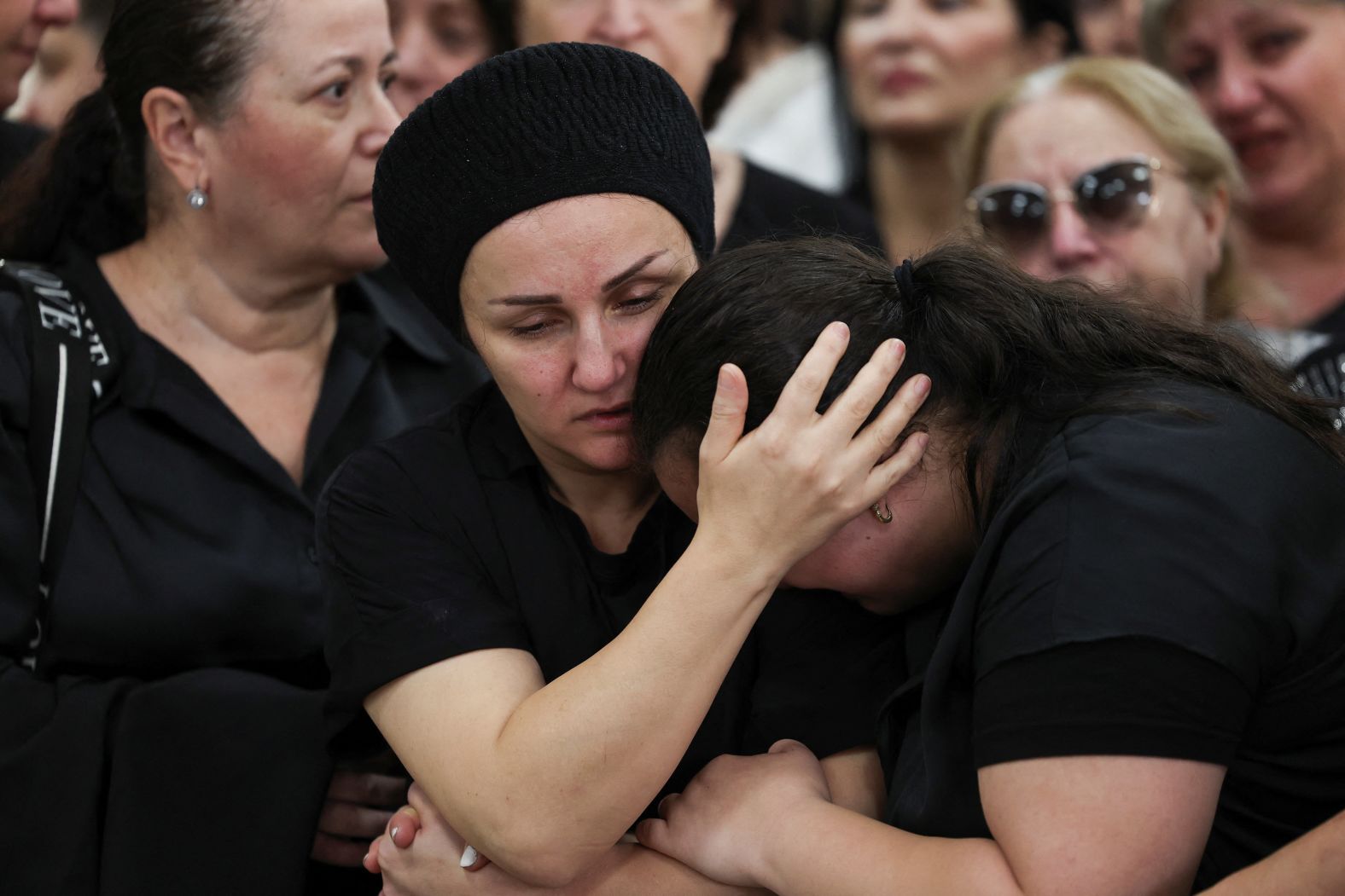 Manna mourns her daughter Tamar Chaya Torpiashvili, a 9-year-old girl who died days after experiencing a cardiac attack during a siren warning of incoming rockets being fired from Gaza into Israel, at her funeral in Ashdod, southern Israel, on October 29.