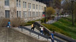 Students walk through the Cornell University campus in Ithaca, New York, US, on April 11, 2023.