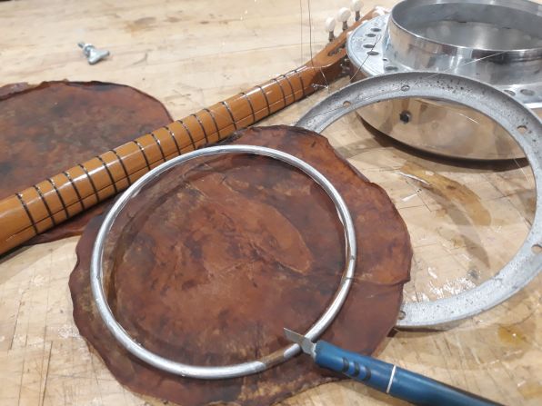 Rosenkrantz has tried creating a banjo head that doesn't use animal skin or plastic. She's  experimented with drying out kombucha, a fermented tea, so that it resembles leather.  