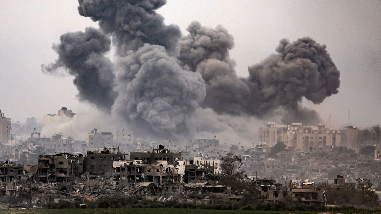 This image taken from the Israeli border with the Gaza Strip on October 29, 2023, shows black smoke ascending from the Gaza Strip amid the ongoing battles between Israel and the Palestinian group Hamas. The Israeli army has raised the number of troops fighting inside the Gaza Strip, a spokesman said on October 29, 2023, as the military stepped up its war on Hamas in the tiny Palestinian territory. Thousands of civilians, both Palestinians and Israelis, have died since October 7, 2023, after Palestinian Hamas militants based in the Gaza Strip entered southern Israel in an unprecedented attack triggering a war declared by Israel on Hamas with retaliatory bombings on Gaza. (Photo by FADEL SENNA / AFP) (Photo by FADEL SENNA/AFP via Getty Images)