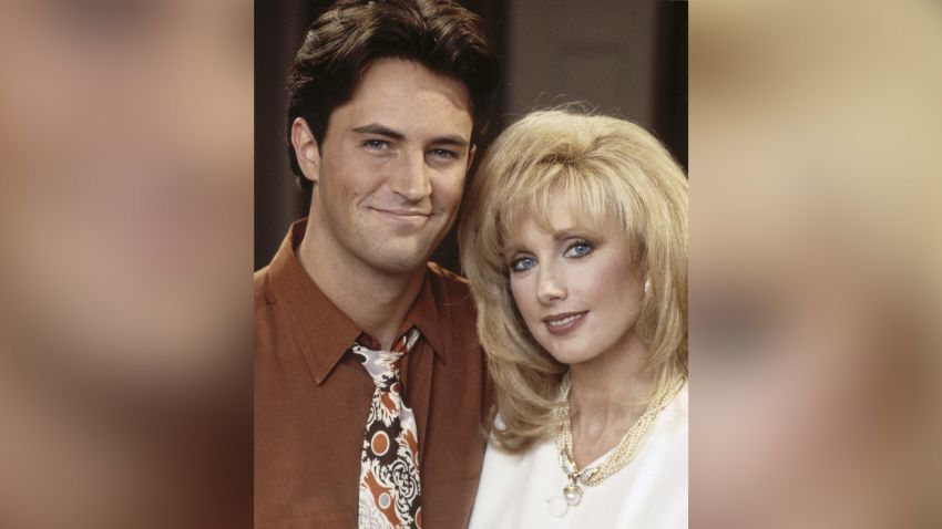 FRIENDS -- "The One With Mrs. Bing" Episode 11 -- Pictured: (l-r) Matthew Perry as Chandler Bing, Morgan Fairchild as Nora Tyler Bing  (Photo by NBCU Photo Bank/NBCUniversal via Getty Images via Getty Images)