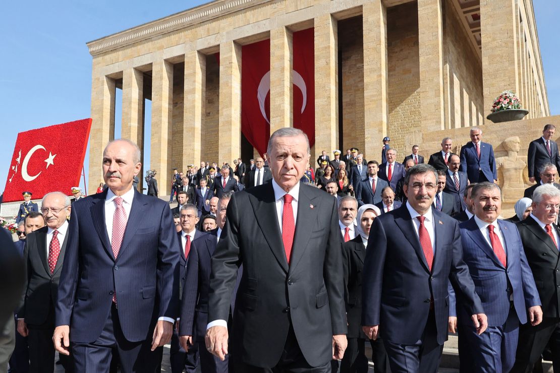TOPSHOT - Turkish President Recep Tayyip Erdogan (C) and state officials visit Anitkabir, the mausoleum of Turkish Republic's Founder Mustafa Kemal Ataturk, to mark the 100th anniversary of Turkish Republic in Ankara, on October 29, 2023. Turkey marked its centenary as a post-Ottoman republic on October 29, 2023, with somewhat muted celebrations held in the shadow of Israel's escalating war with Hamas militants in Gaza. President Recep Tayyip Erdogan was front and centre of day-long events that both honour the secular republic's founder and play up the achievement of the Islamic-rooted party that has run Turkey since 2002. (Photo by Adem ALTAN / AFP) (Photo by ADEM ALTAN/AFP via Getty Images)