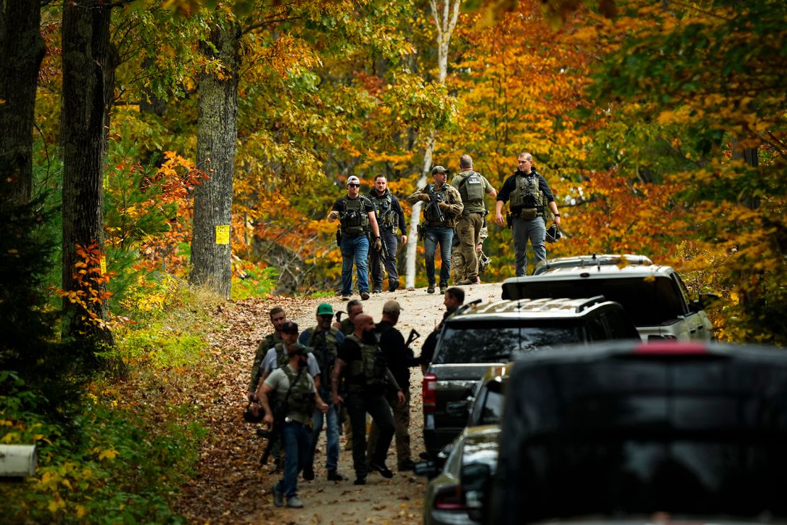 Law enforcement continue a manhunt in the aftermath of a mass shooting, in Durham, Maine, Friday, October 27, 2023.