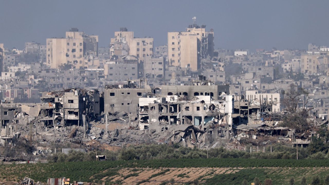 A picture taken from Israel's southern city of Sderot shows destroyed buildings as a result of the Israeli bombardment of the northern Gaza Strip on October 30, 2023, amid ongoing battles between Israel and the Palestinian Hamas movement. Thousands of civilians, both Palestinians and Israelis, have died since October 7, 2023, after Palestinian Hamas militants based in the Gaza Strip entered southern Israel in an unprecedented attack triggering a war declared by Israel on Hamas with retaliatory bombings on Gaza. (Photo by JACK GUEZ / AFP) (Photo by JACK GUEZ/AFP via Getty Images)