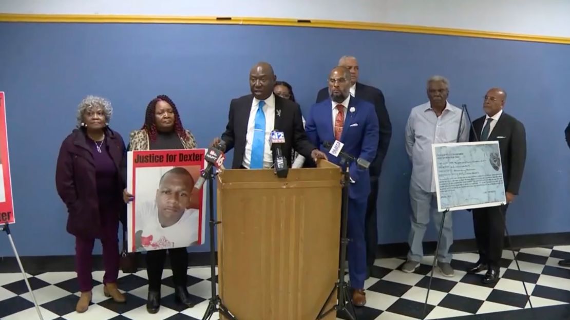 Civil Rights Attorney Ben Crump, center, speaks alongside the family of Dexter Wade during a press conference in Jackson, Mississippi, on October 30, 2023.