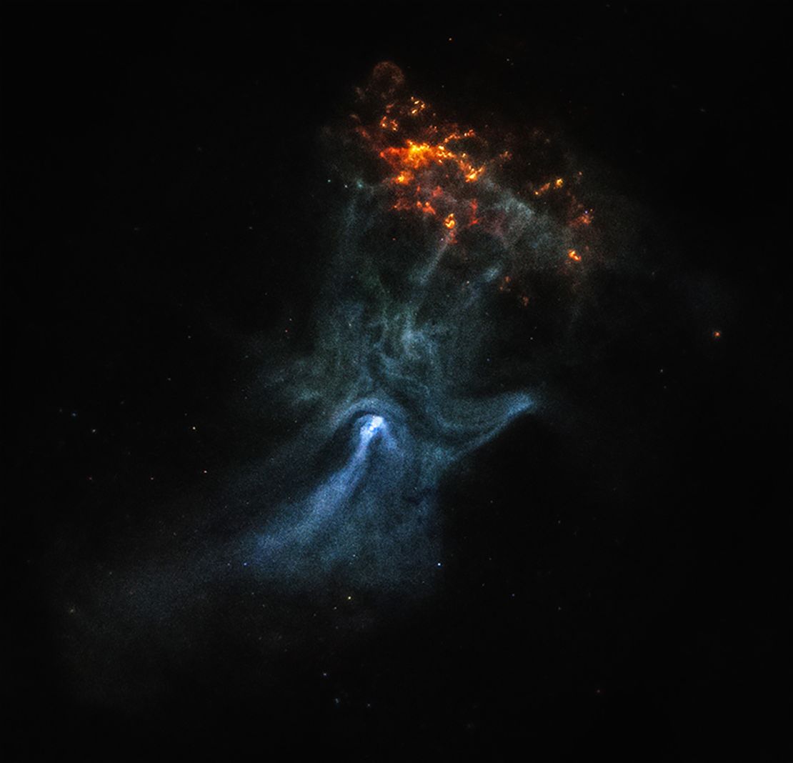 This release features a composite image of a pulsar wind nebula, which strongly resembles a ghostly purple hand with sparkling fingertips.
A pulsar is a highly magnetized collapsed star that rotates and creates jets of matter flowing away from its poles. These jets, along with intense winds of particles, form pulsar wind nebulae. Here, the pulsar wind nebula known as MSH 15-52 resembles a hazy purple cloud set against a black, starry backdrop. Both NASA's Chandra X-ray Observatory and the Imaging X-ray Polarimetry Explorer (IXPE) have observed MSH 15-52. Their observations revealed that the shape of this pulsar wind nebula strongly resembles a human hand, including five fingers, a palm and wrist. The bright white spot near the base of the palm is the pulsar itself. The three longest fingertips of the hand-shape point toward our upper right, or 1:00 on a clock face. There, a small, mottled, orange and yellow cloud appears to sparkle or glow like embers. This orange cloud is part of the remains of the supernova explosion that created the pulsar. The backdrop of stars was captured in infrared light.