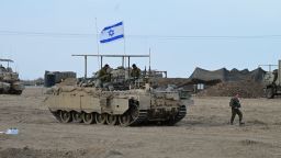 Israeli soldiers are seen mustering near Gaza on October 29, 2023.