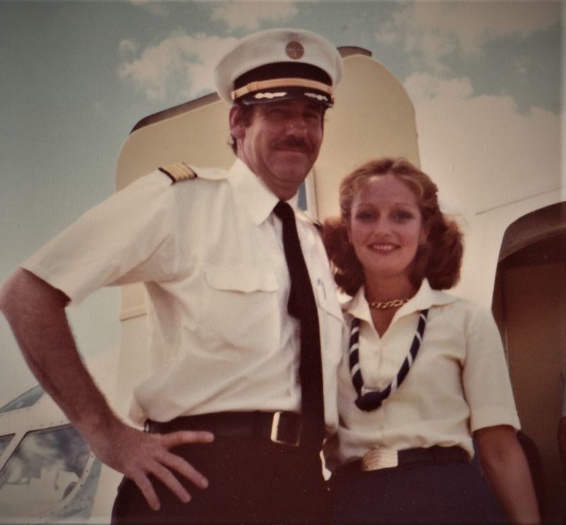 She was a Pan Am flight attendant, he was a pilot. Their inflight