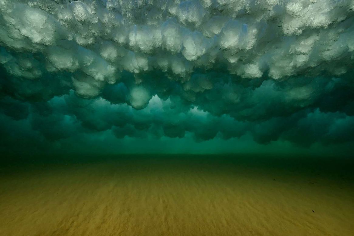 They may look like clouds in the sky, but Angel Fitor captured this underwater shot of waves breaking in Spain.