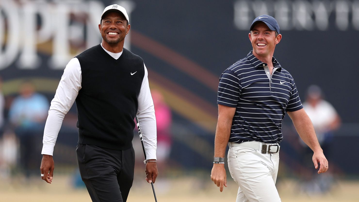 Tiger Woods of The USA and Rory McIlroy of Northern Ireland on the 18th fairway  during the Celebration of Champions prior to The 150th Open at St Andrews Old Course on July 11, 2022 in St Andrews, Scotland.