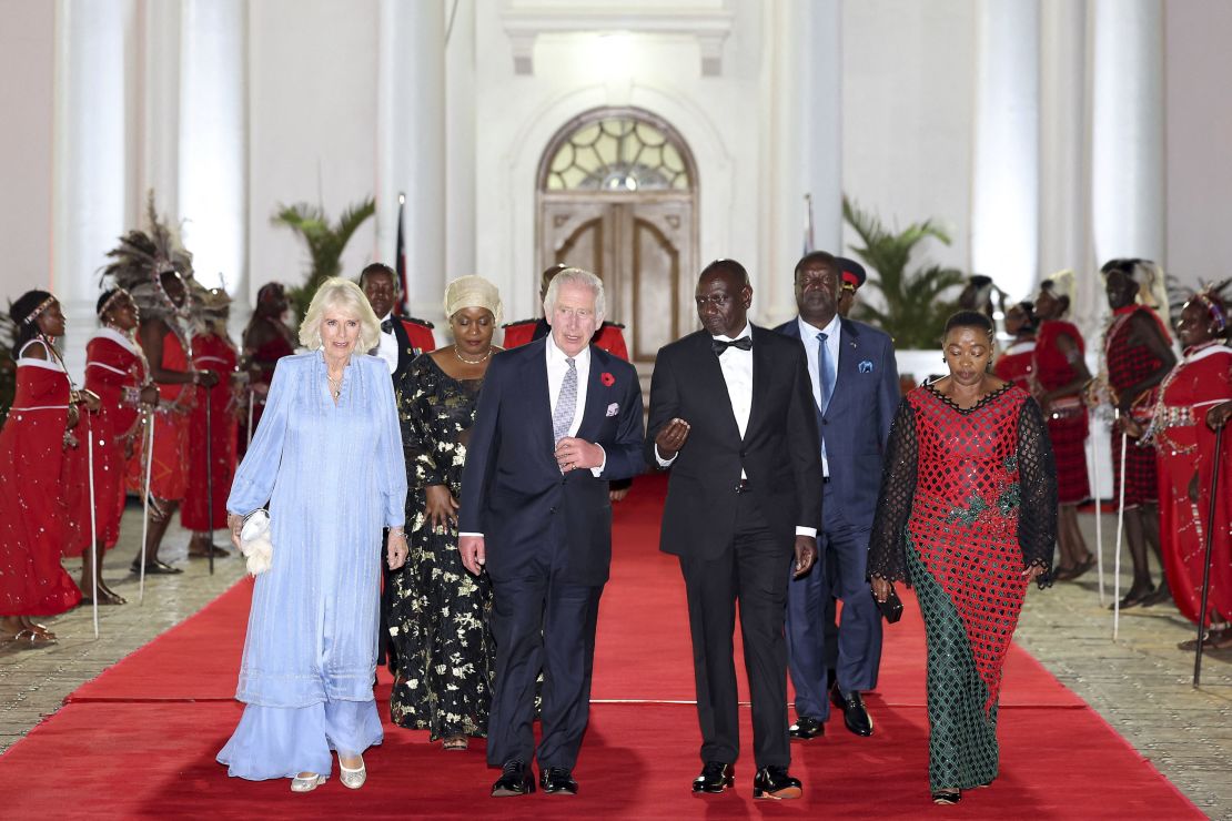 King Charles and Queen Camilla walk with Kenyan President William Ruto and Kenyan first lady Rachel Ruto as they arrive at the state banquet in Nairobi on October 31.