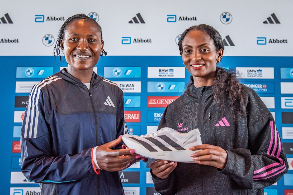 BERLIN, GERMANY - SEPTEMBER 21: Sheila Chepkirui from Kenya and Tigist Assefa from Ethiopia holding the Adidas Running Shoes Adizero Adios Pro Evo 1 Lightstrike Pro ahead of the 2023 BMW Berlin-Marathon on September 21, 2023 in Berlin, Germany. (Photo by Luciano Lima/Getty Images)