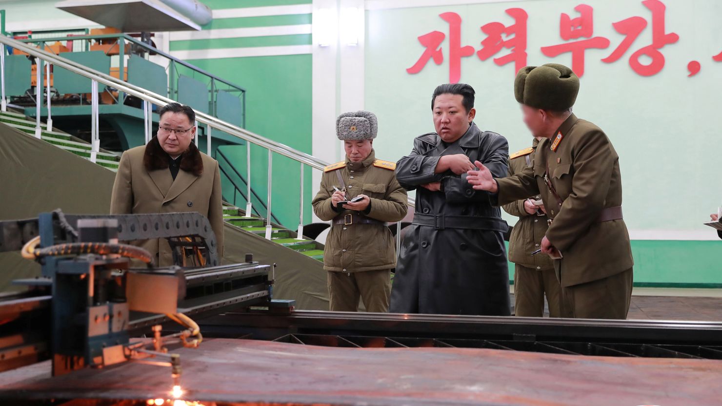North Korea leader Kim Jong Un visits a munitions factory producing what state media KCNA says is a "major weapon system" at an undisclosed location in North Korea, in this photo released January 28, 2022 by North Korea's Korean Central News Agency (KCNA).    KCNA via REUTERS    ATTENTION EDITORS - THIS IMAGE WAS PROVIDED BY A THIRD PARTY. REUTERS IS UNABLE TO INDEPENDENTLY VERIFY THIS IMAGE. NO THIRD PARTY SALES. SOUTH KOREA OUT. NO COMMERCIAL OR EDITORIAL SALES IN SOUTH KOREA. THE IMAGE WAS DIGITALLY MASKED AT SOURCE.