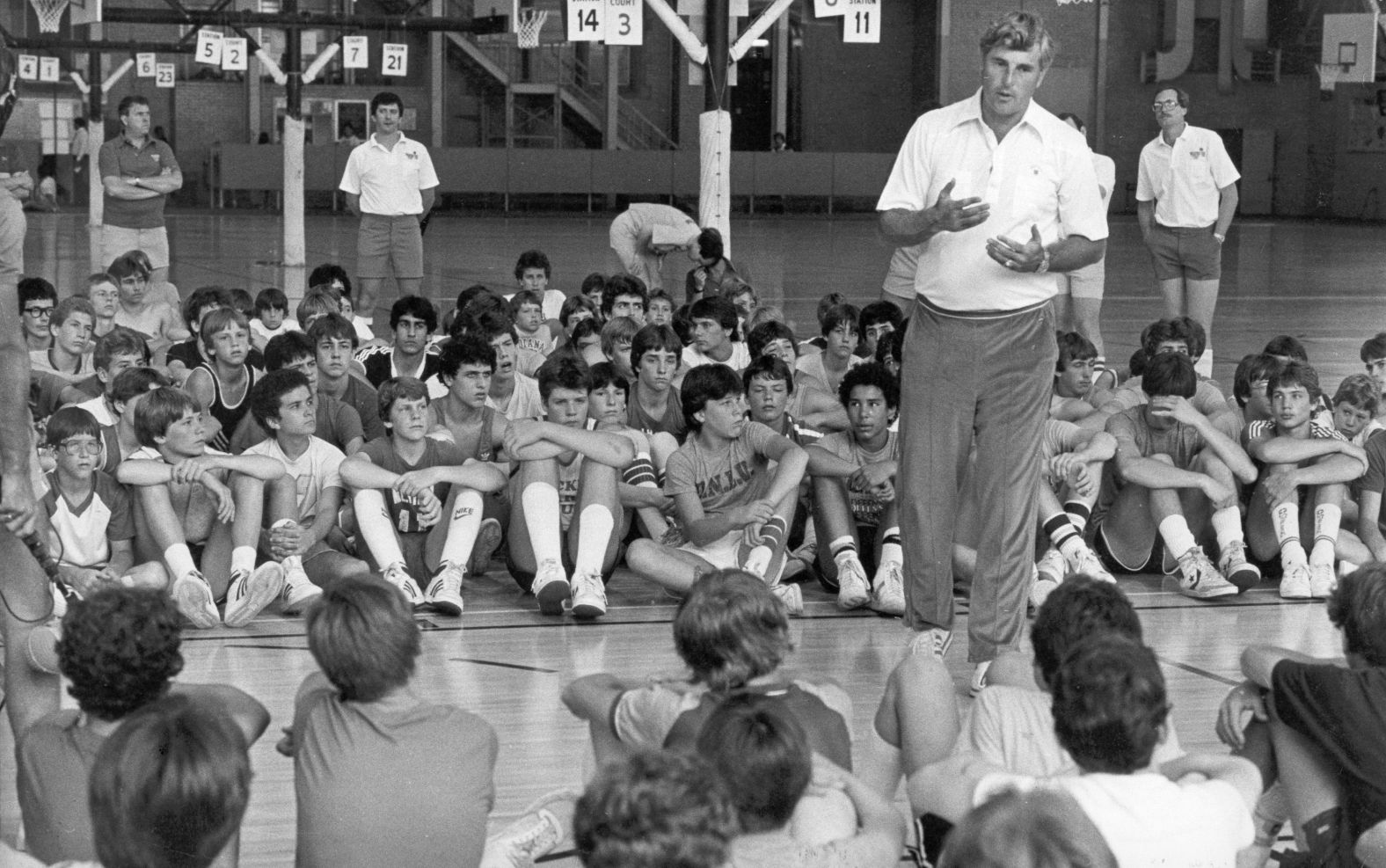 Knight talks to a group of young basketball players attending the Bobby Knight Basketball School in 1983.