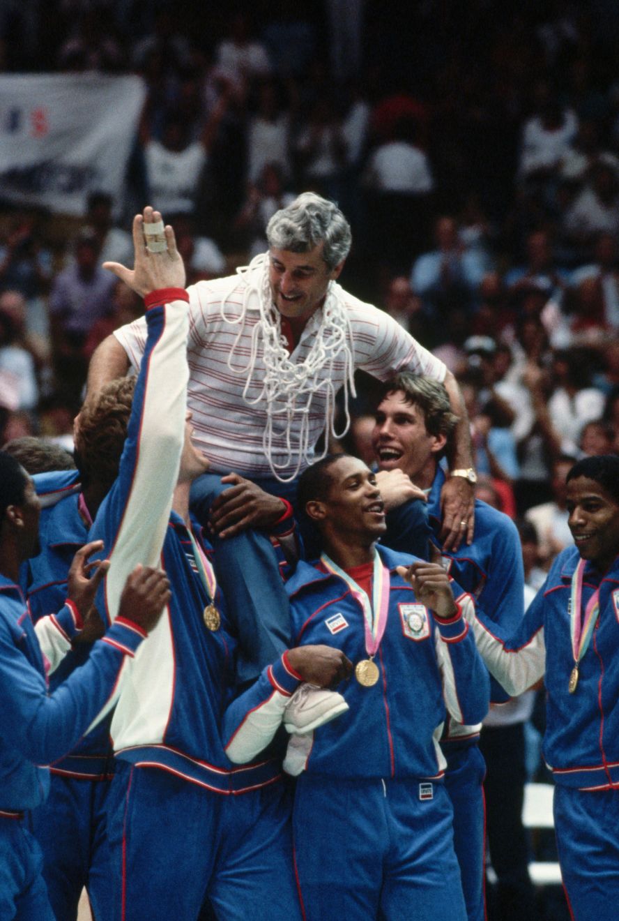 The US Men's Olympic basketball team carries Knight after winning the gold medal at the 1984 Olympics in Los Angeles.