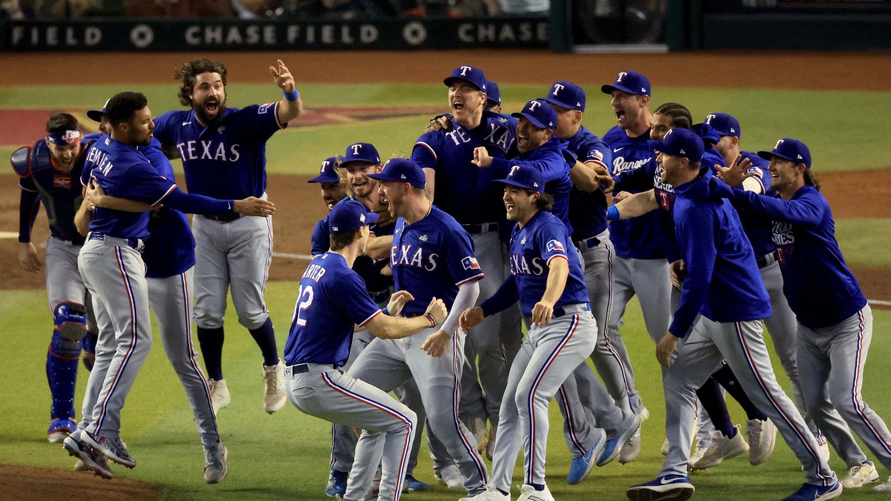 The Texas Rangers celebrate after beating the Arizona Diamondbacks 5-0 in Game Five to win the World Series at Chase Field on November 01, 2023 in Phoenix, Arizona.