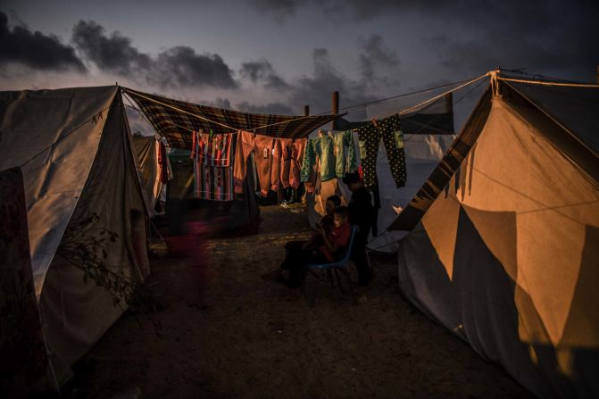 Palestinian families take shelter in the United Nations Relief and Works Agency refugee camp in Khan Younis, Gaza, on November 1.