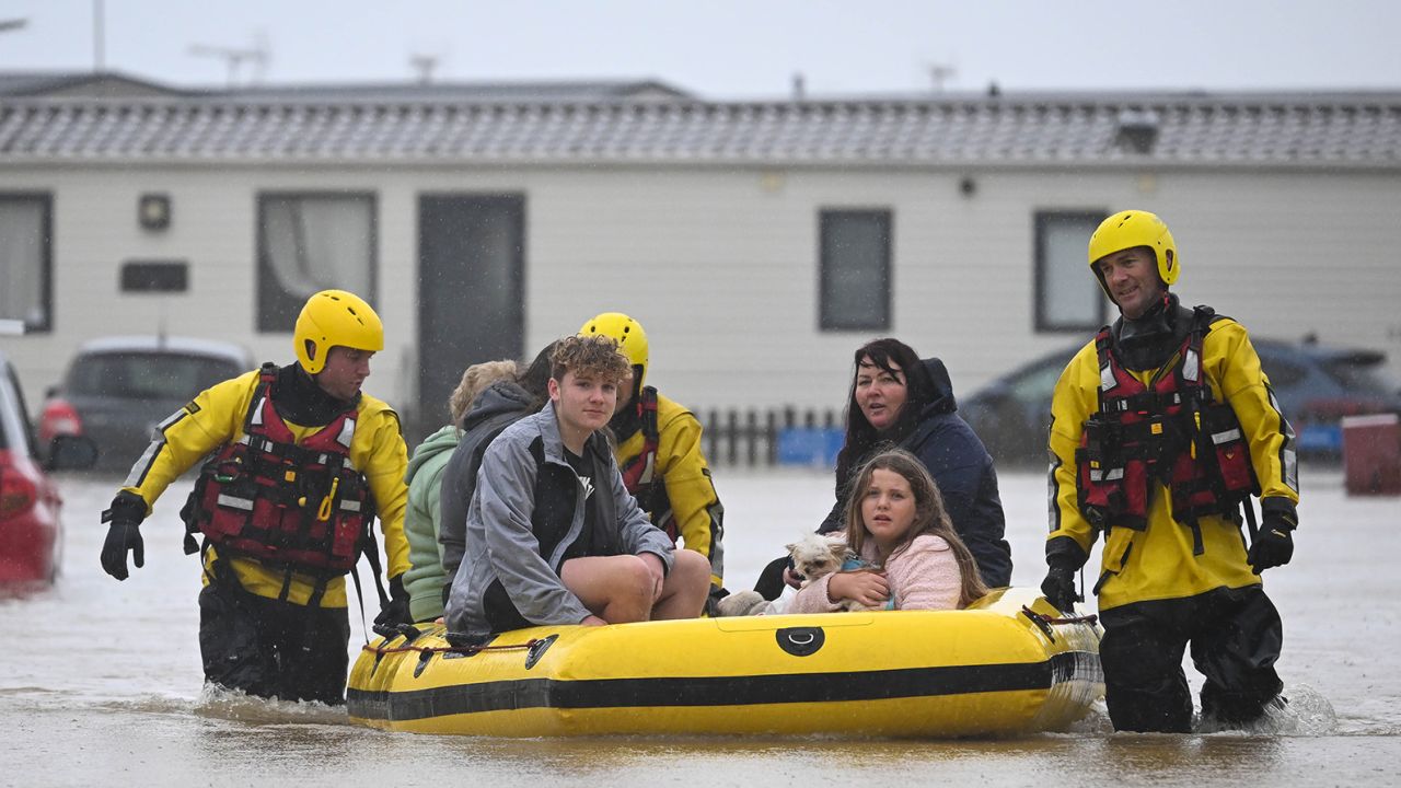 BURTON BRADSTOCK, DORSET - NOVEMBER 02: People are rescued from their holiday chalets by fire and rescue at Freshwater Beach Holiday Park, on November 02, 2023 in Burton Bradstock, Dorset. Storm Ciaran swept across the southwest and south of England overnight posing a formidable threat in certain areas such as Jersey, where winds exceeded 100 mph overnight. This, along with the already-soaked ground from Storm Babet, increases the risk of flooding in already vulnerable areas. (Photo by Finnbarr Webster/Getty Images)