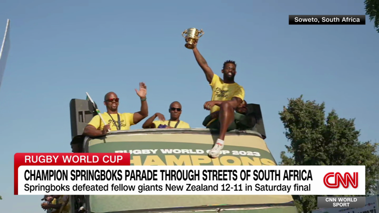 exp South Africa rugby parade Scholes McKenzie 110210aseg1 CNNI Sports_00043803.png