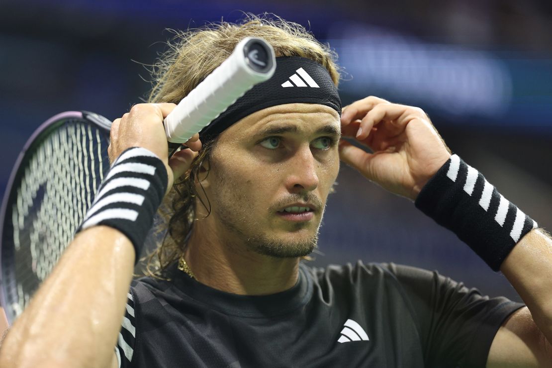NEW YORK, NEW YORK - SEPTEMBER 06: Alexander Zverev of Germany adjusts his headband against Carlos Alcaraz of Spain during their Men's Singles Quarterfinal match on Day Ten of the 2023 US Open at the USTA Billie Jean King National Tennis Center on September 06, 2023 in the Flushing neighborhood of the Queens borough of New York City. (Photo by Elsa/Getty Images)