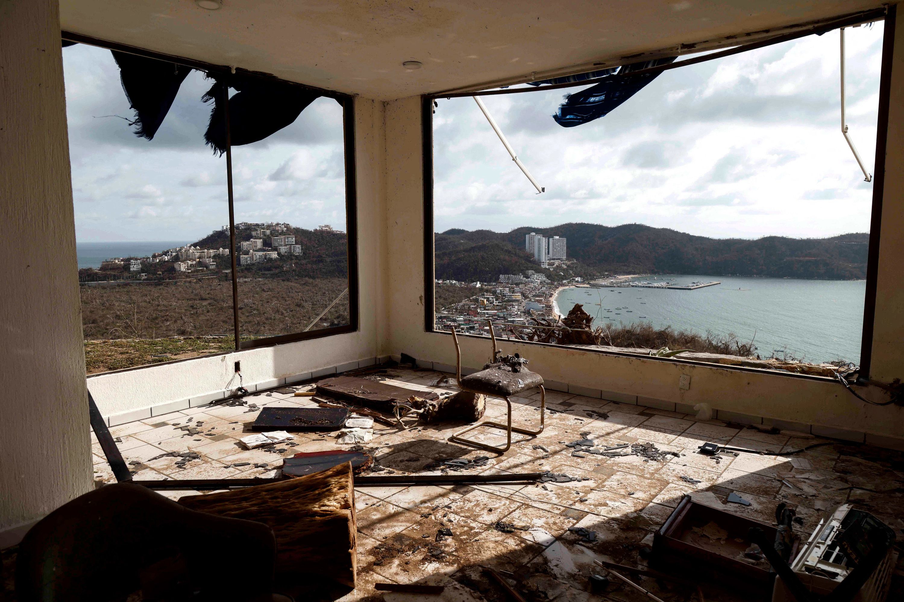 Debris is strewn around an office damaged by Hurricane Otis in Acapulco, Mexico, on Friday, October 27. At least 45 people have died and 47 remain missing after the Category 5 storm tore through Mexico's southern Guerrero state.