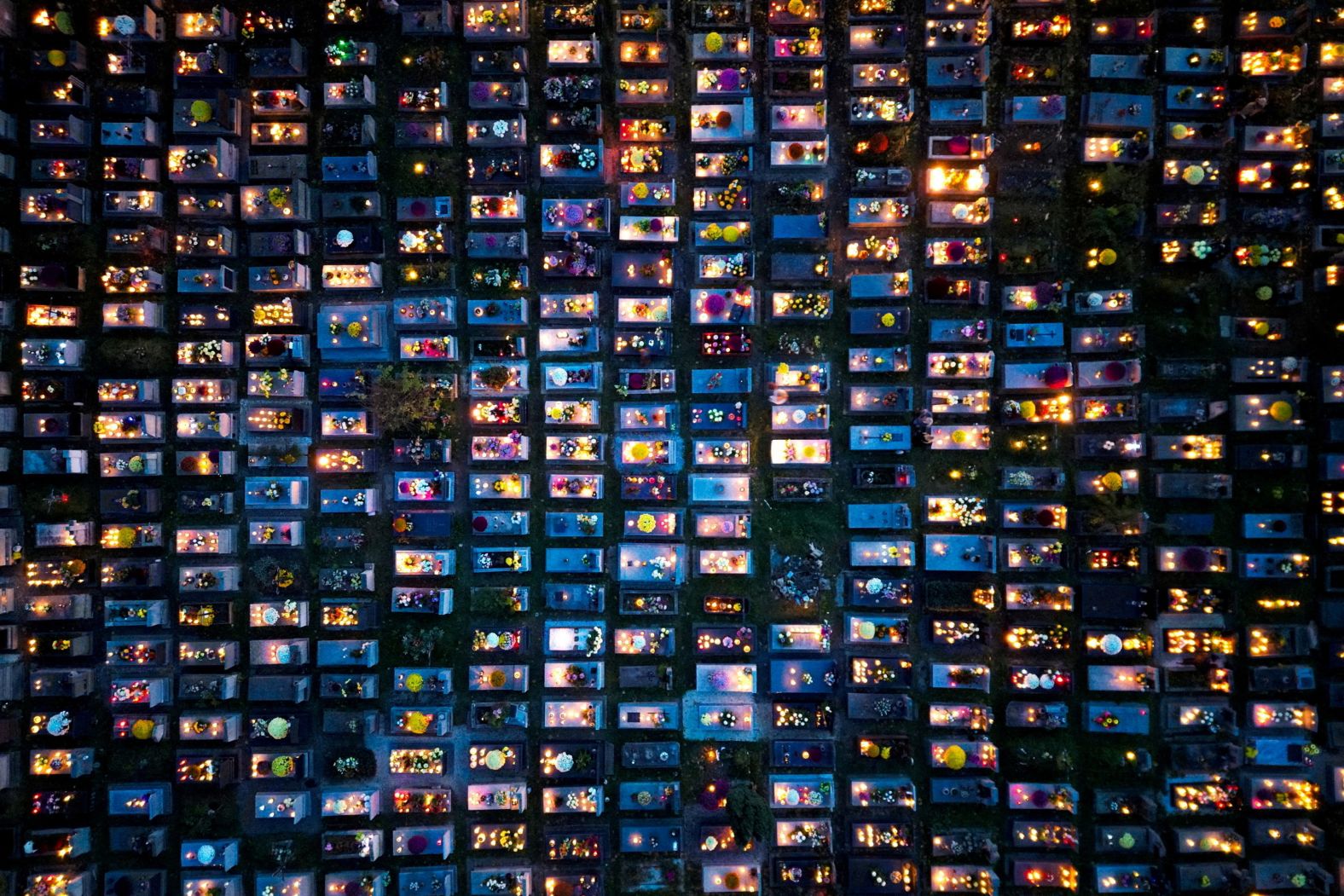 Rakowiecki Cemetery is lit by candles during All Saints' Day in Krakow, Poland, on Wednesday, November 1.