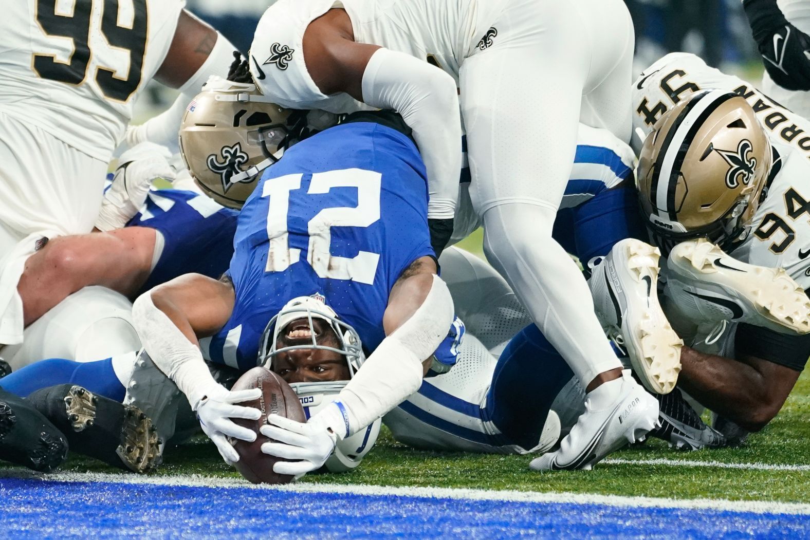 Indianapolis Colts running back Zack Moss reaches for a one-yard touchdown run during the Colts' 38-27 loss to the New Orleans Saints in Indianapolis on Sunday, October 29.