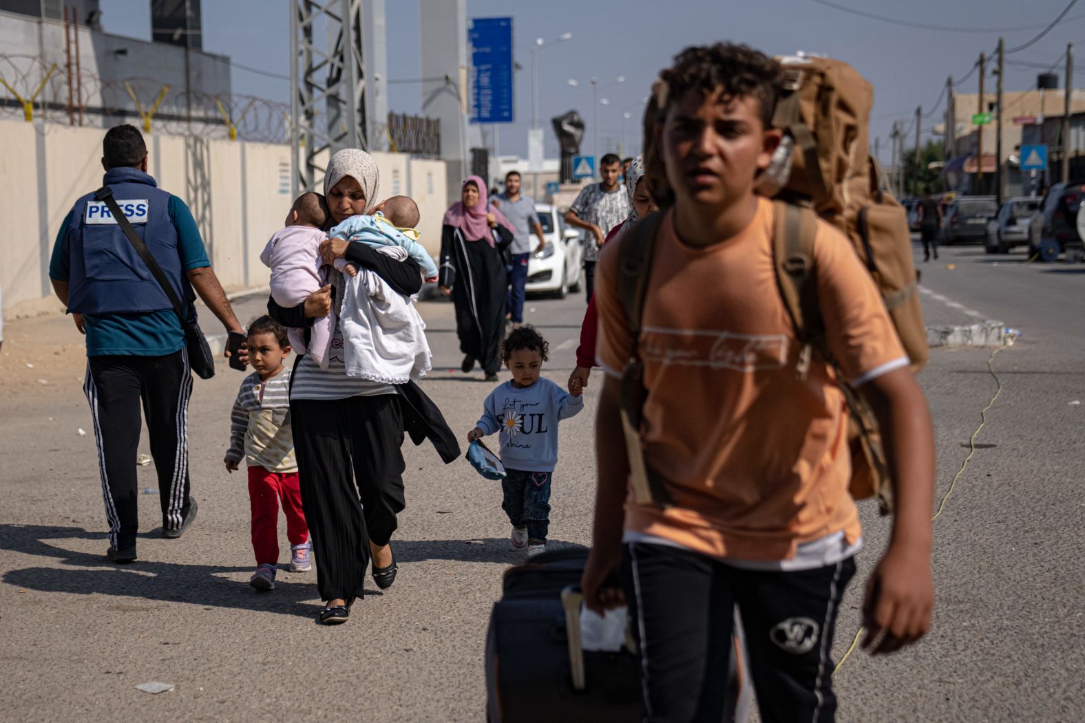 Palestinians arrive at Rafah, the border crossing between Gaza and Egypt, on Wednesday, November 1. Injured Palestinians and hundreds of foreign nationals <a href="https://www.cnn.com/2023/11/01/middleeast/rafah-border-crossing-egypt-foreign-nationals-gaza-intl-hnk/index.html" target="_blank">started crossing into Egypt</a> on Wednesday in the first sanctioned exodus from the <a href="https://www.cnn.com/middleeast/live-news/israel-hamas-war-gaza-news-11-01-23/" target="_blank">besieged enclave</a> in weeks.